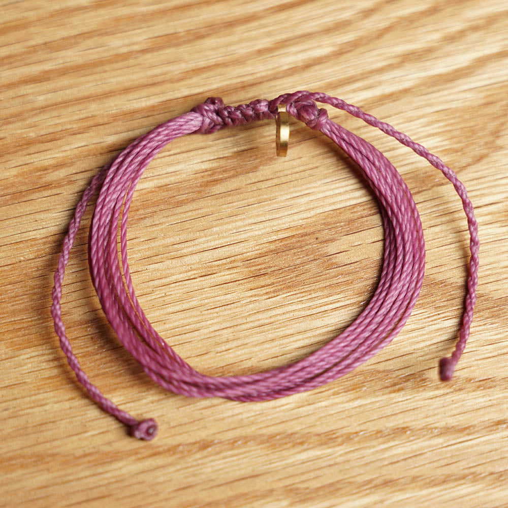 PULSERA AJUSTABLE HILO ENCERADO “COSMICA ORIGINAL MORADO”