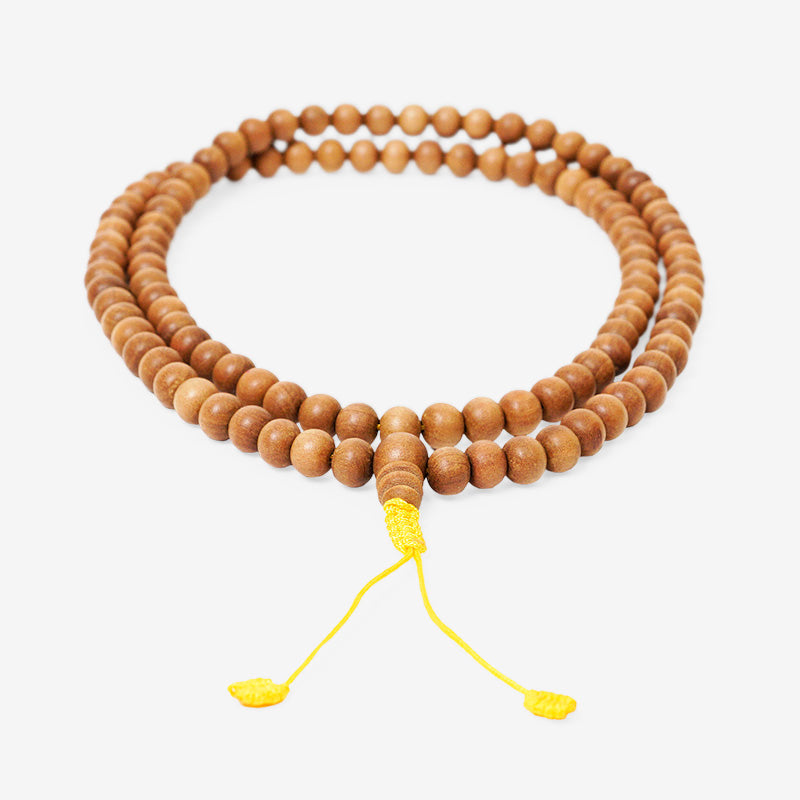 JAPA MALA 108 CUENTAS MADERA DE SÁNDALO AMARILLO