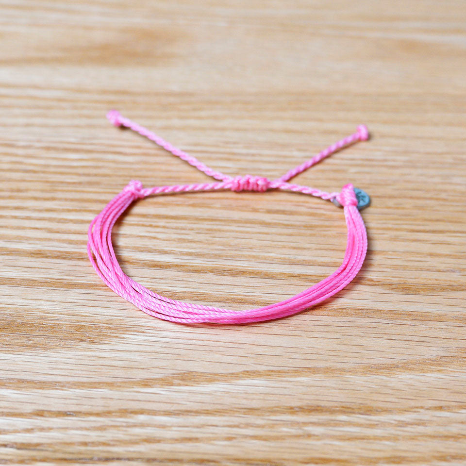 PULSERA AJUSTABLE HILO ENCERADO “COSMICA ORIGINAL ROSA”