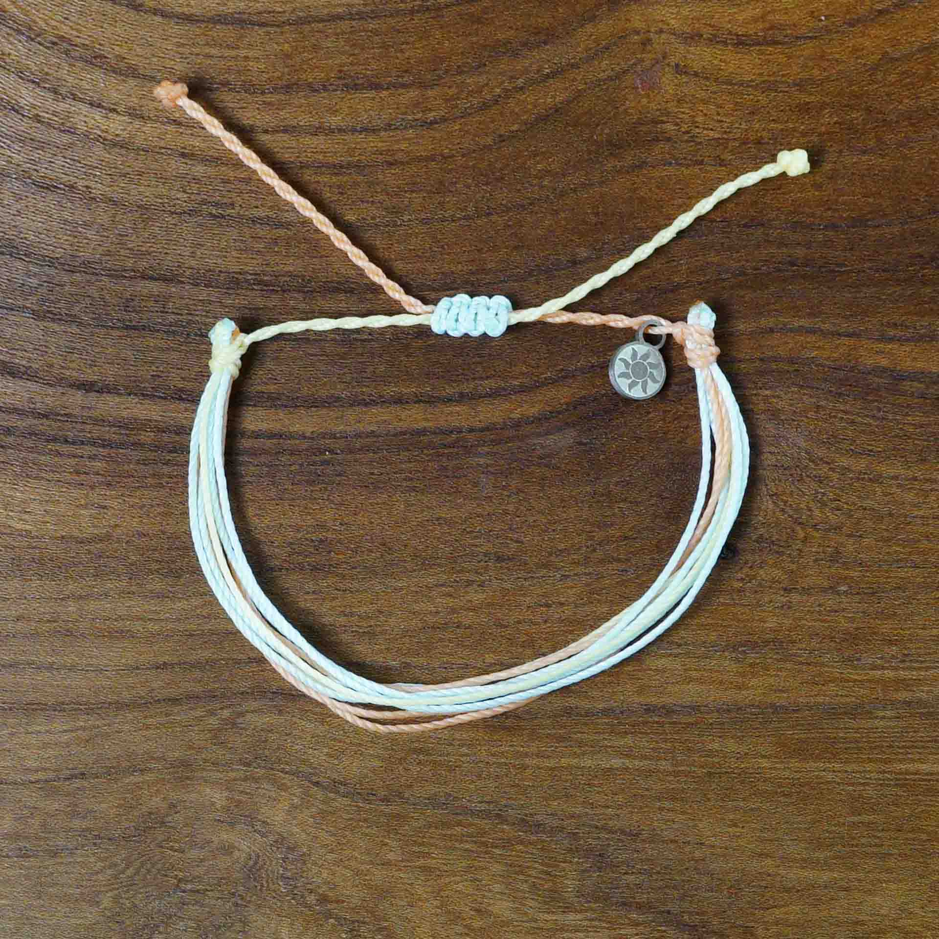 PULSERA AJUSTABLE HILO ENCERADO “LUZ DEL AMANECER”