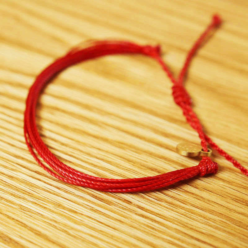 PULSERA AJUSTABLE HILO ENCERADO “COSMICA ORIGINAL ROJO”