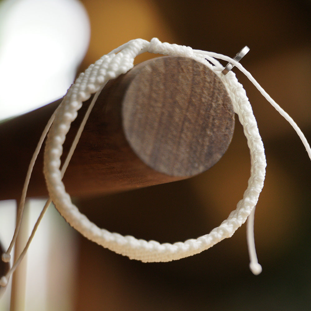 PULSERA AJUSTABLE TRENZADA HILO ENCERADO “TIERRA ANCESTRAL”