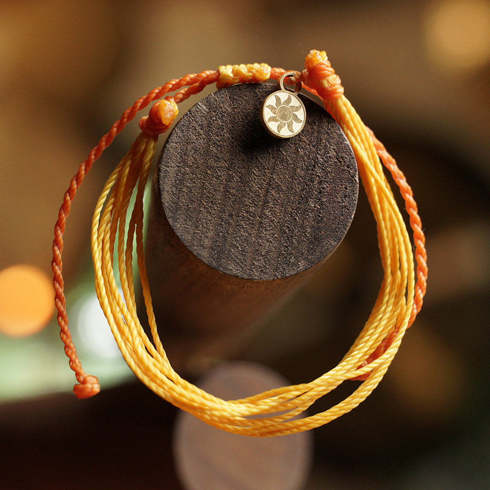 PULSERA AJUSTABLE HILO ENCERADO “GALAXIA GIRASOL”